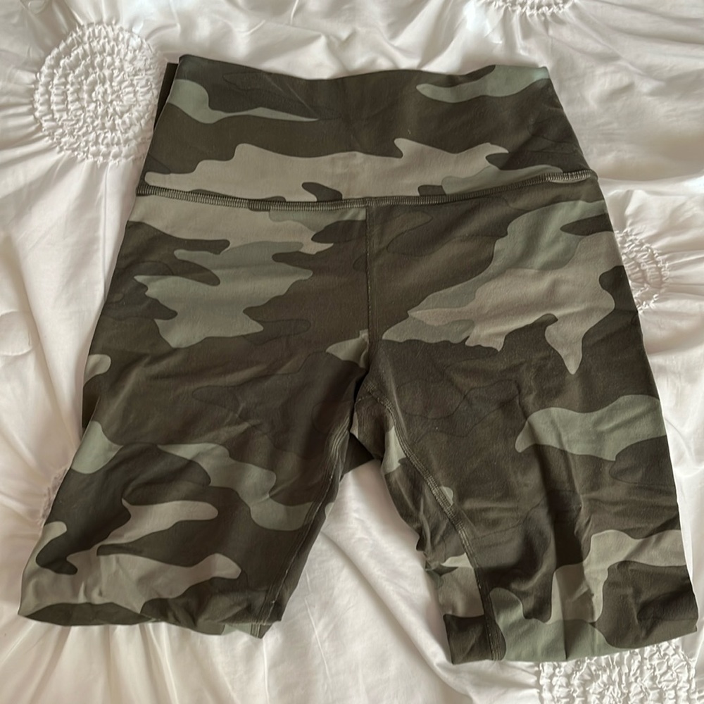 Pink Victoria’s Secret size medium green camouflage leggings